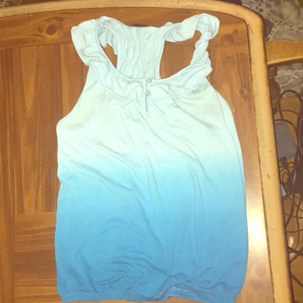 An ombré blue halter top shirt